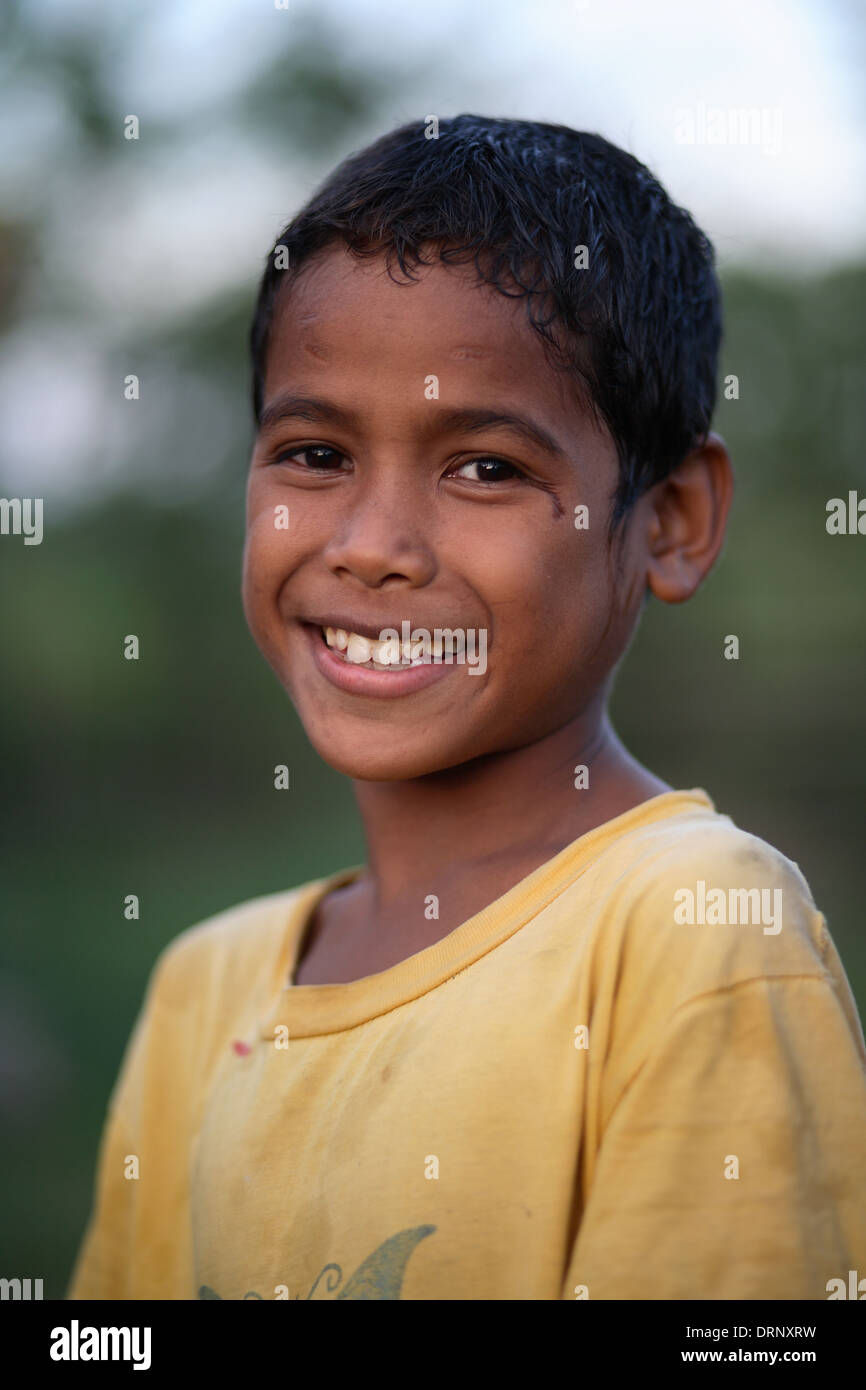 Portrait of Indonesian boy looking at the camera. Sumba Island ...