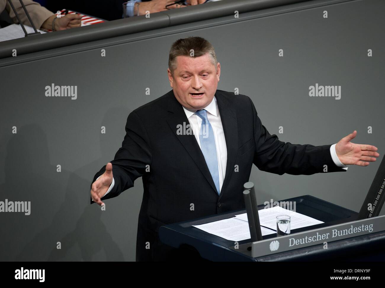 Berlin, Germany. 30th Jan, 2014. German Health Minister Hermann Groehe talks during a session of the German Parliament in Berlin, Germany, 30 January 2014. Photo: DANIEL NAUPOLD/dpa/Alamy Live News Stock Photo