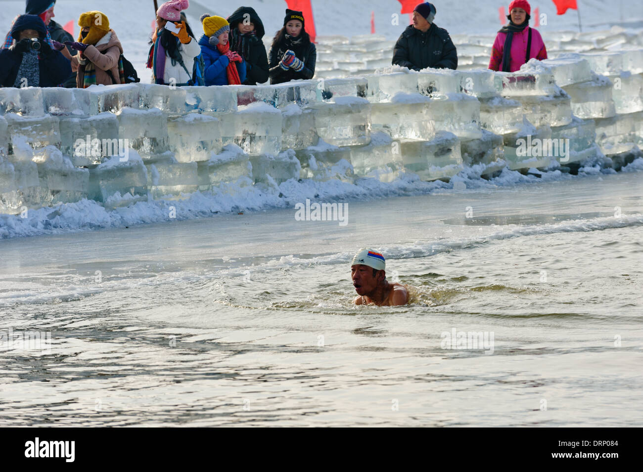 Ice swimmer swims in the cold water of the Songhua river, Harbin, China