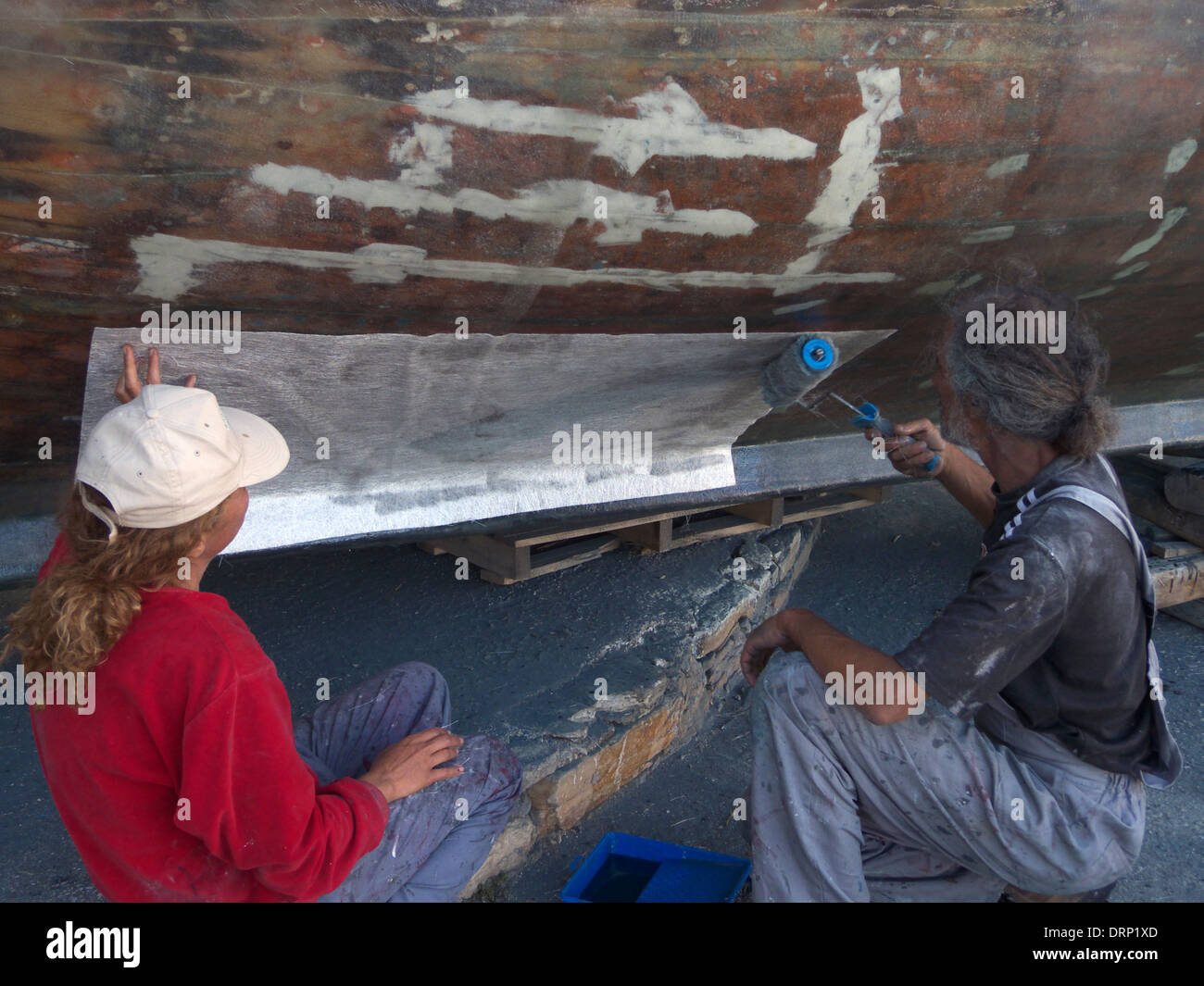 greece cyclades sikinos repairing a fiberglass boat Stock Photo