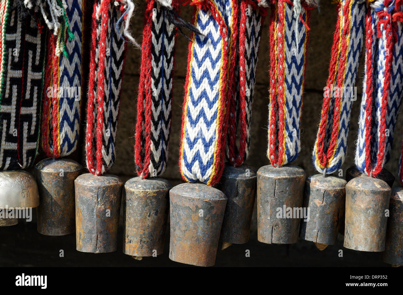 Souvenir cow bells for sale on a Nepal market Stock Photo