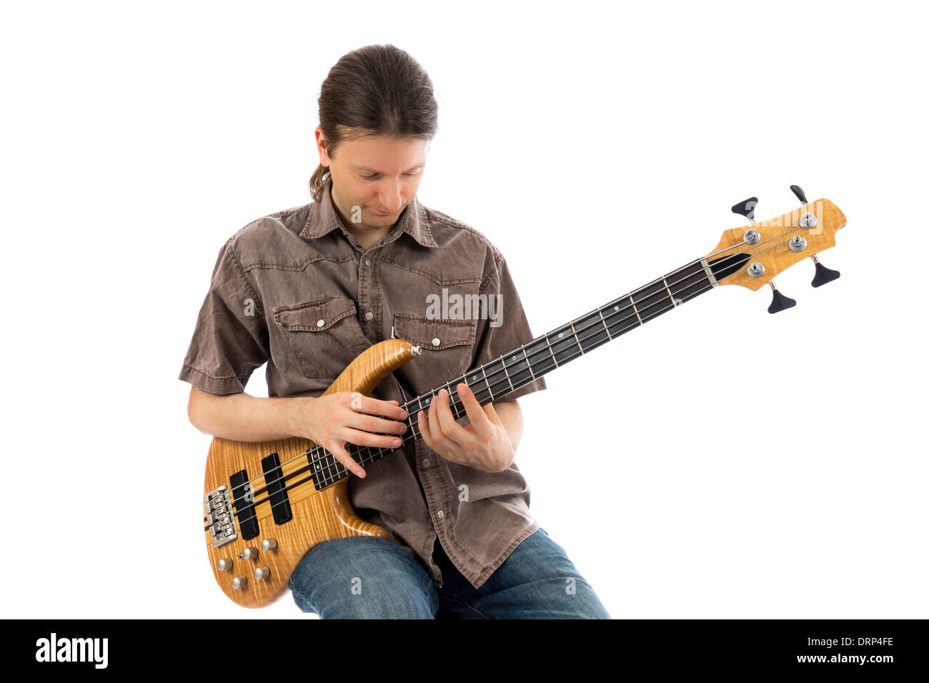 Bass guitarist playing a bass guitar (Series with the same model available) Stock Photo