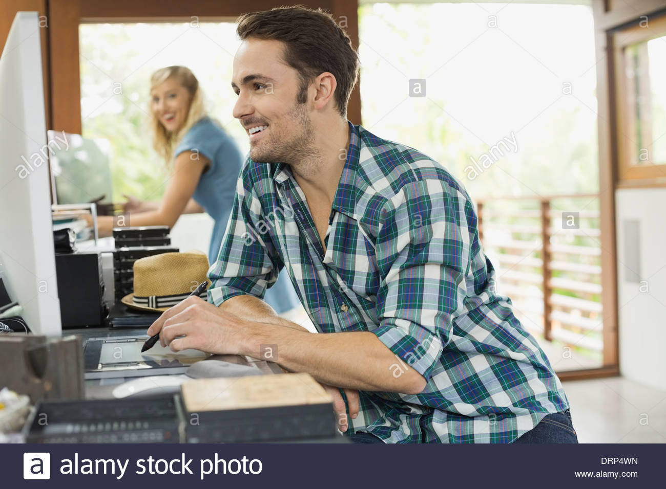 Working professionals in home office Stock Photo