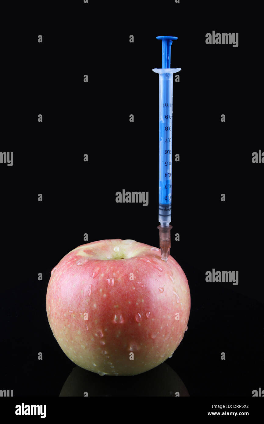 apple and injector Stock Photo