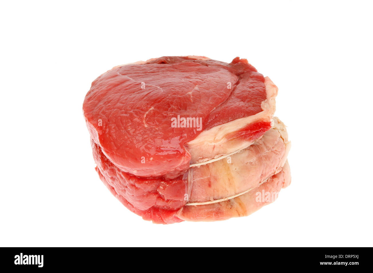 Raw joint of beef isolated against white Stock Photo
