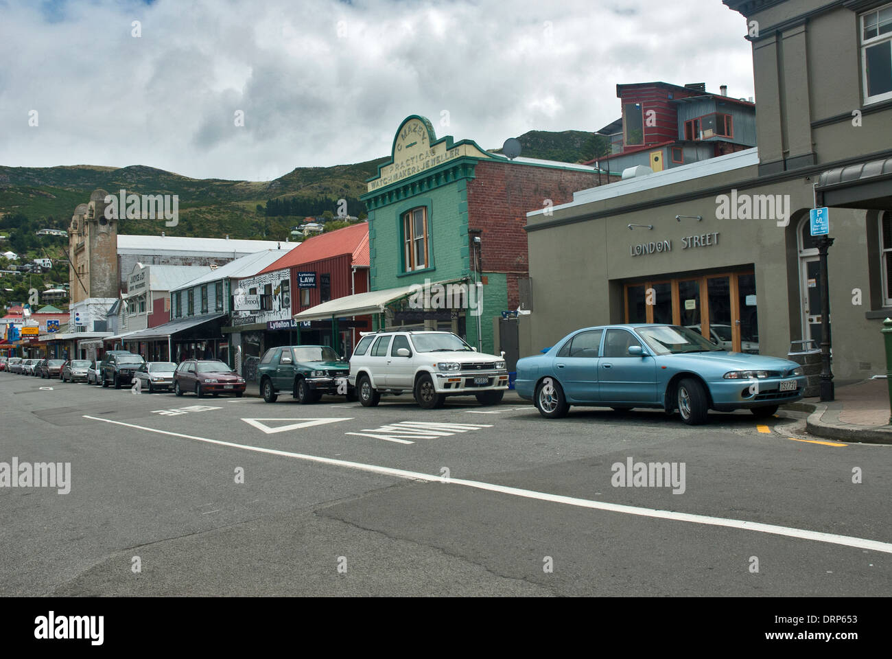 Cars parked in the main street of Lyttleton in South Island, New Zealand Stock Photo
