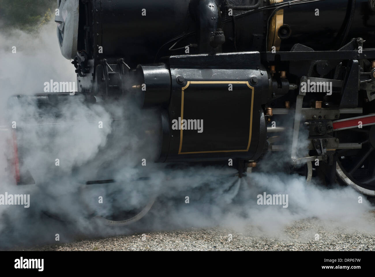 Steam from the Kingston Flyer vintage steam train with Thomas the tank engine face. Stock Photo