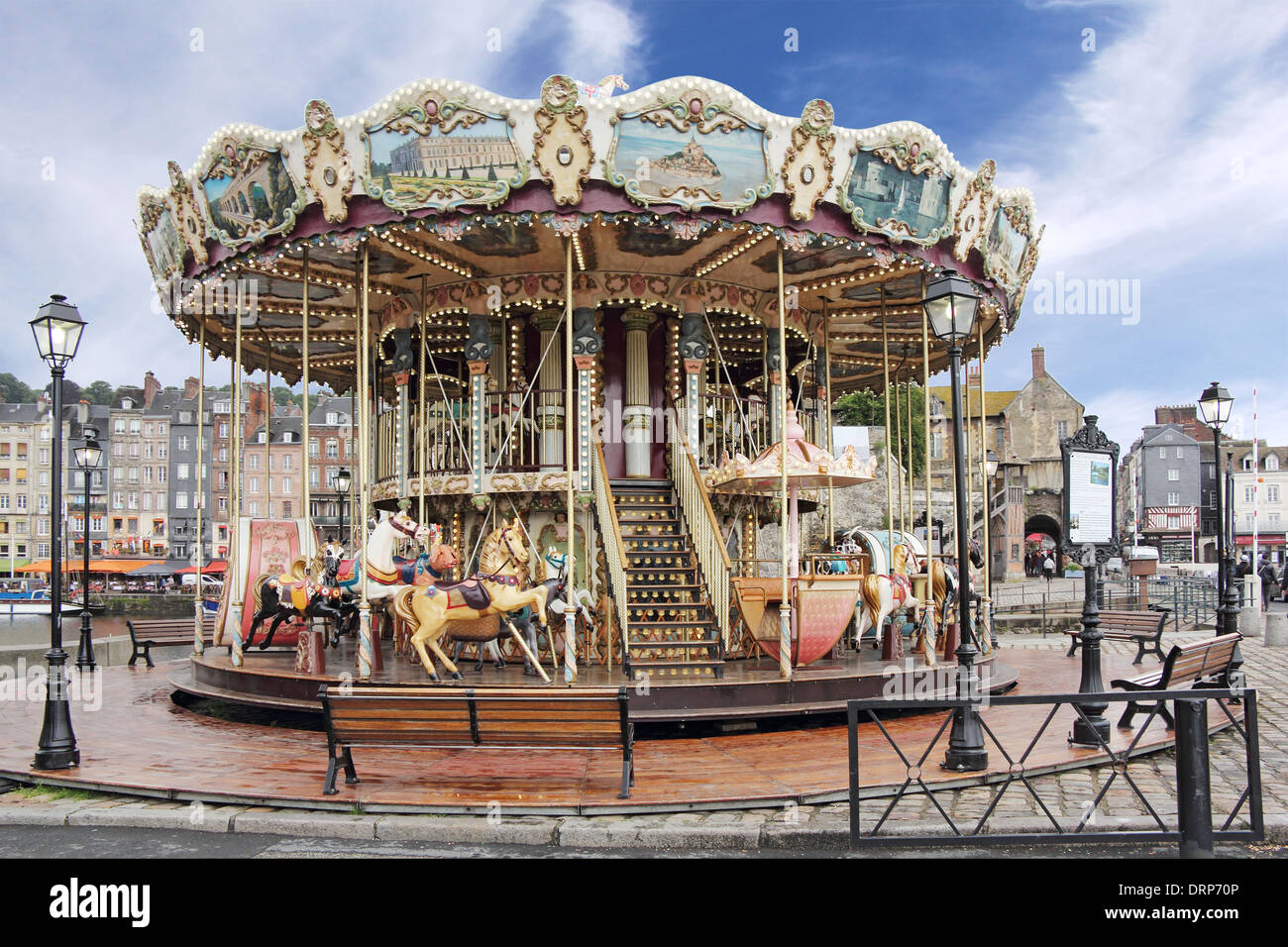 Old wooden carousel in Honfleur, a small medieval harbor in Normandy, France Stock Photo