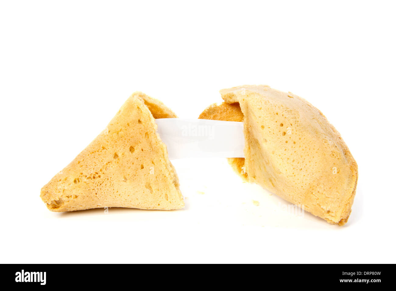 Opened fortune cookie without text against white background Stock Photo