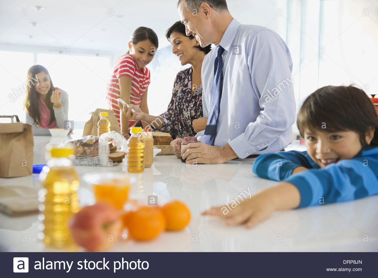 Family having breakfast at home Stock Photo