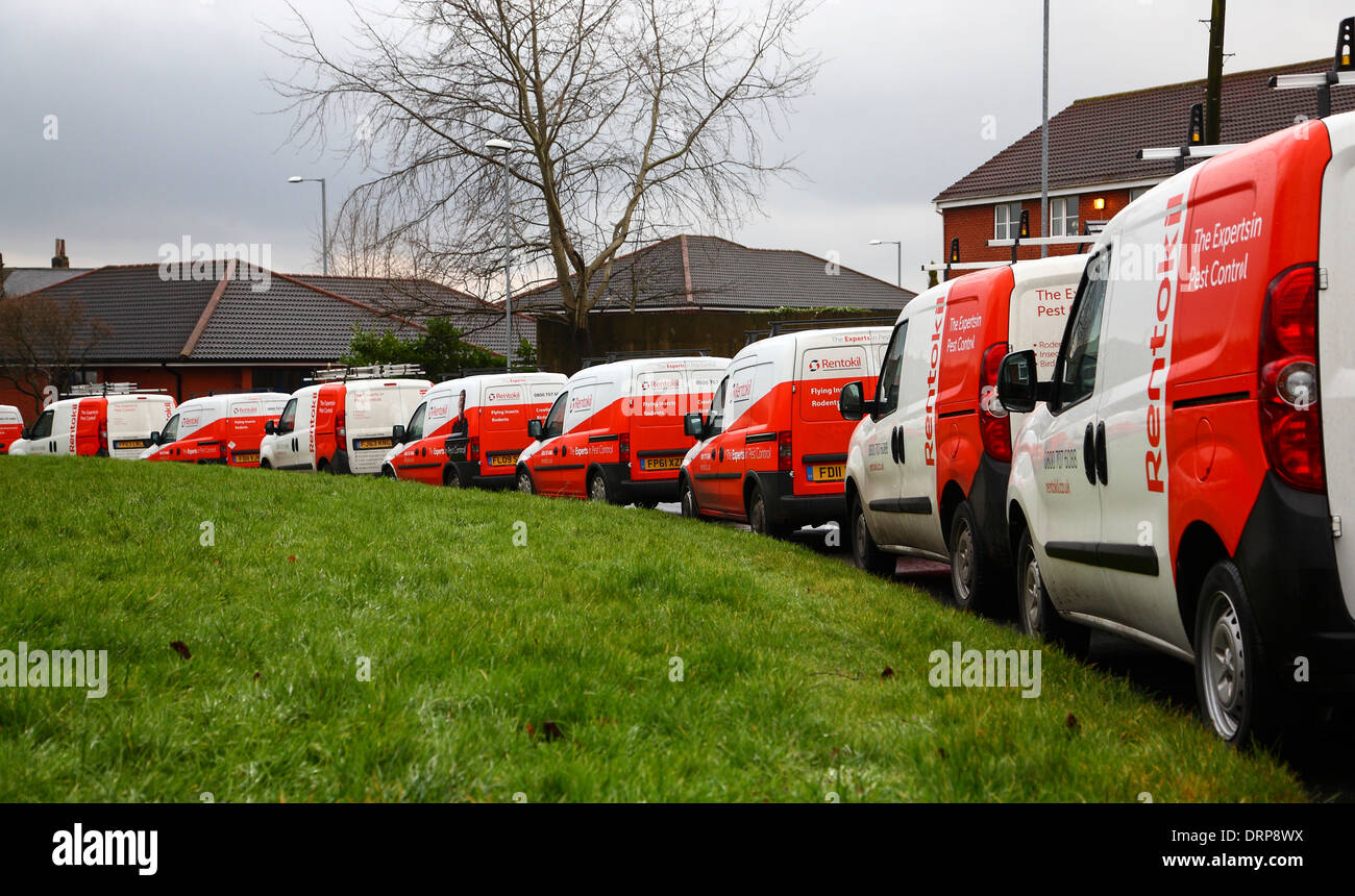 A line of Rentokil vans parked on an urban street Stock Photo - Alamy
