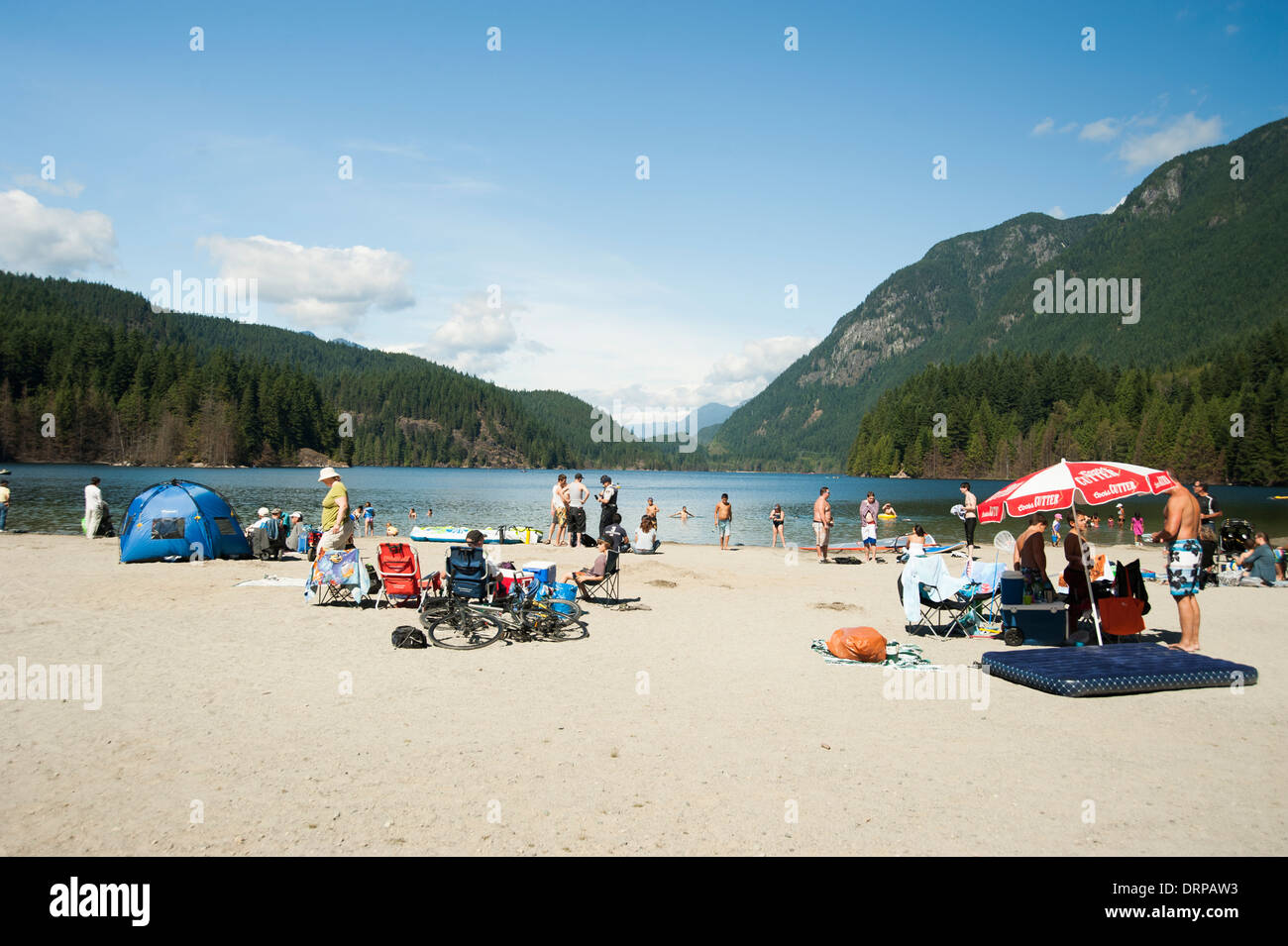 People at the beach at Buntzen Lake, Port Moody, British Columbia, Canada in summer Stock Photo
