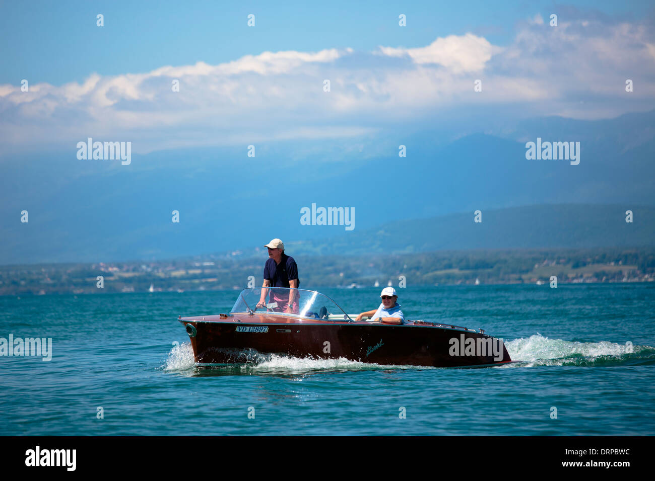 Powerboat Boesch Deluxe 5.6 luxury speedboat crosses Lac Leman, Lake Geneva, near Evian-les-Bains, France Stock Photo