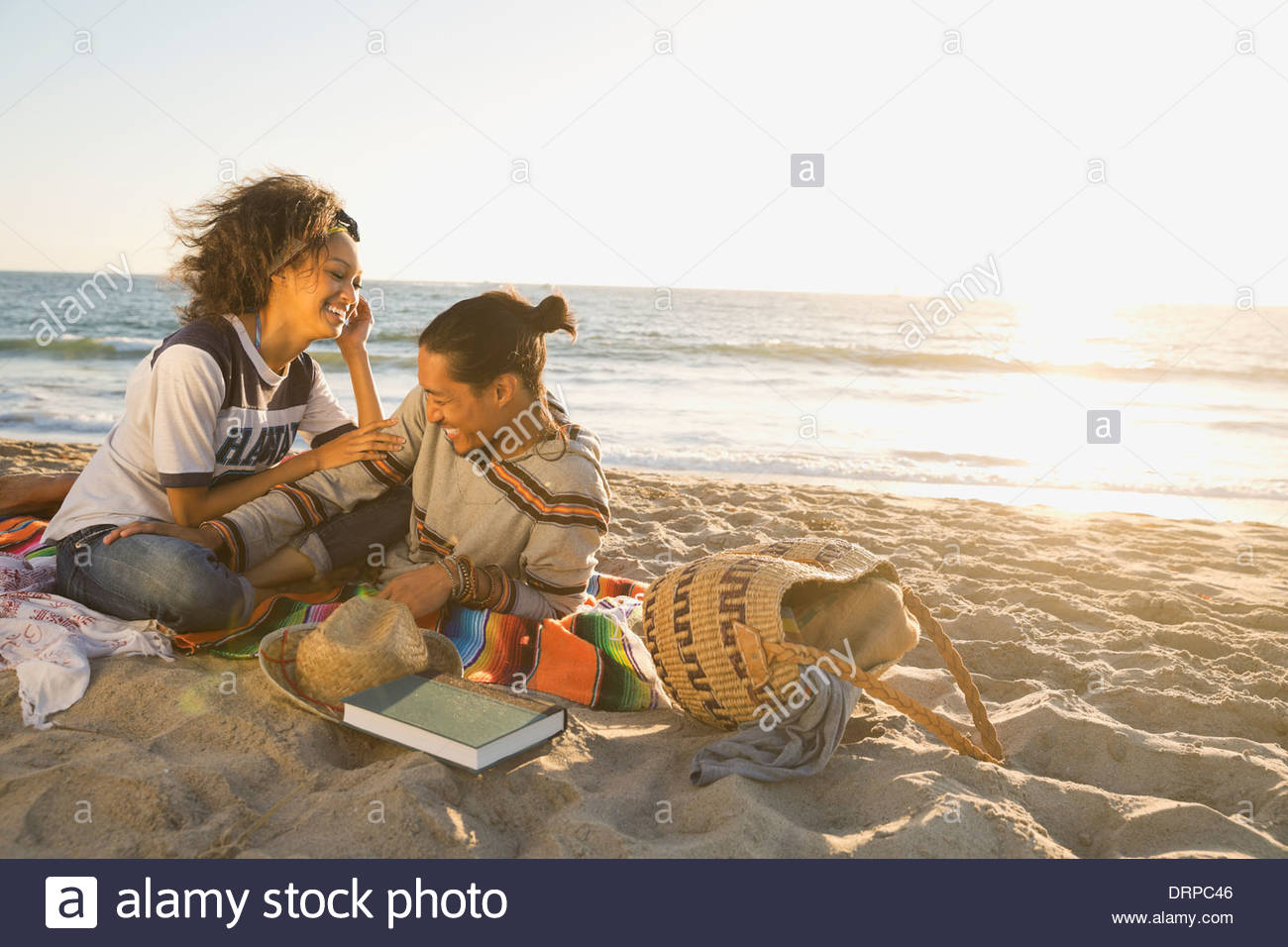 Couple spending leisure time at beach Stock Photo