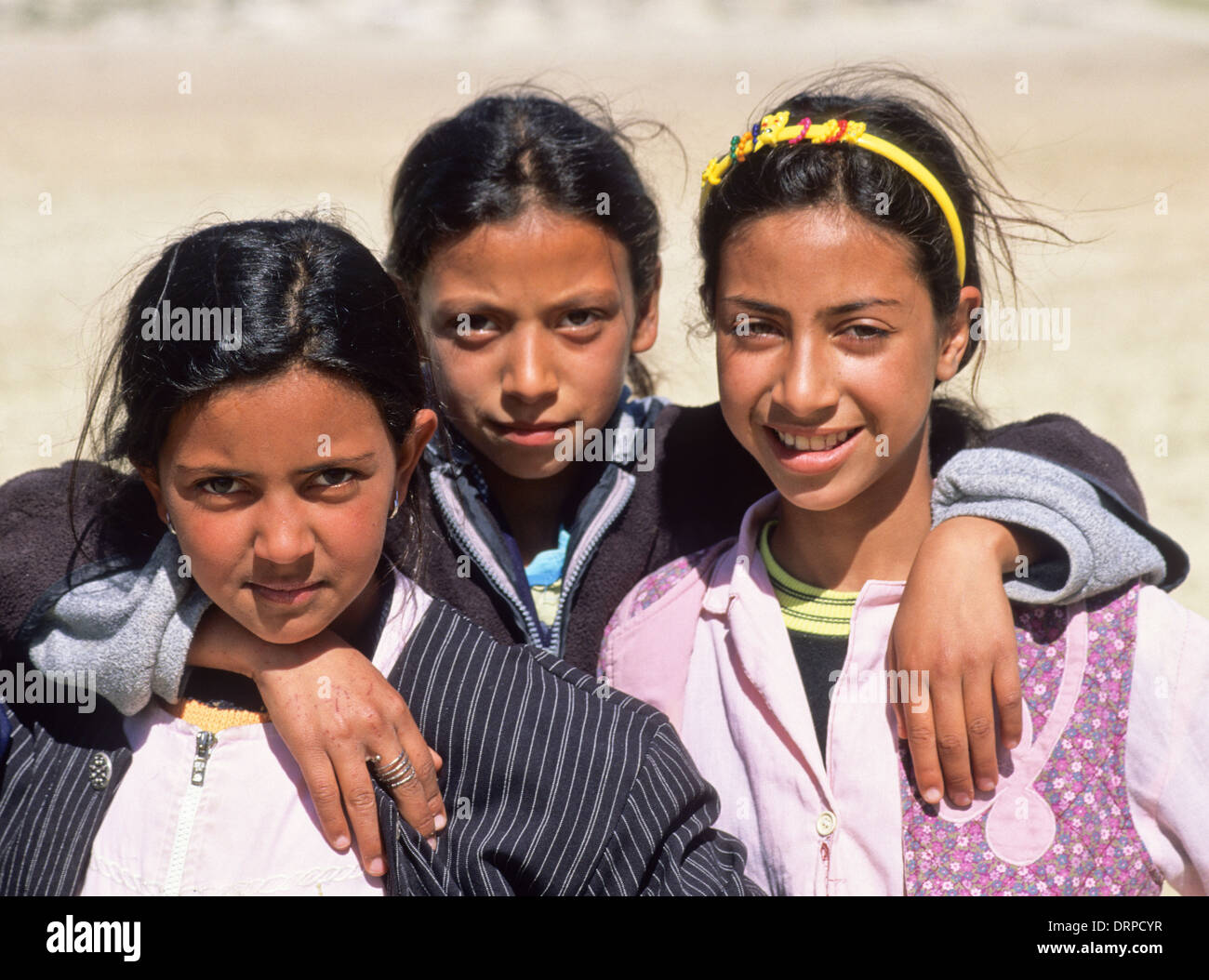 Tunisia, Le Kef. Three Tunisian Schoolgirls. Stock Photo