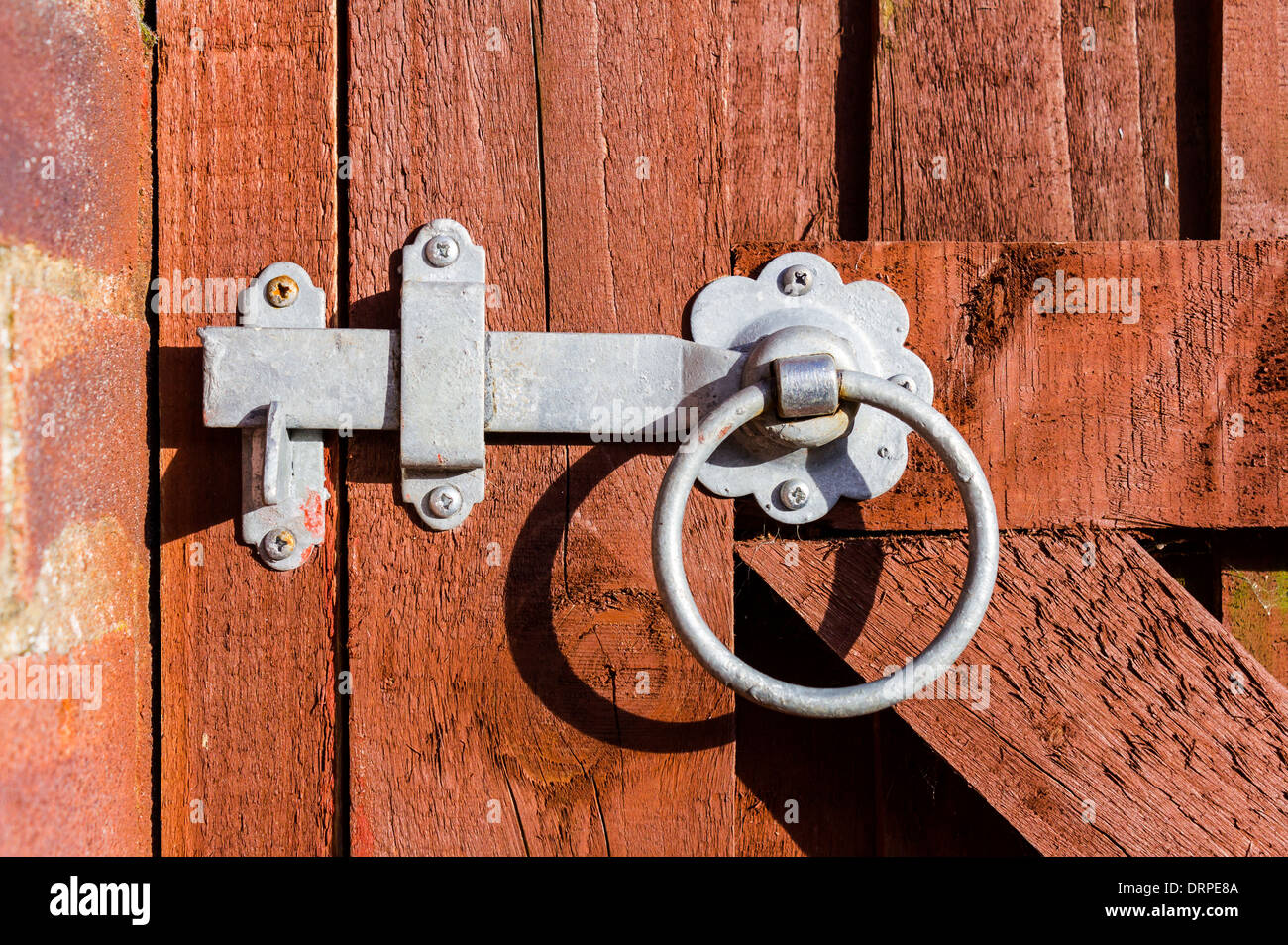 A latch on a fence Stock Photo