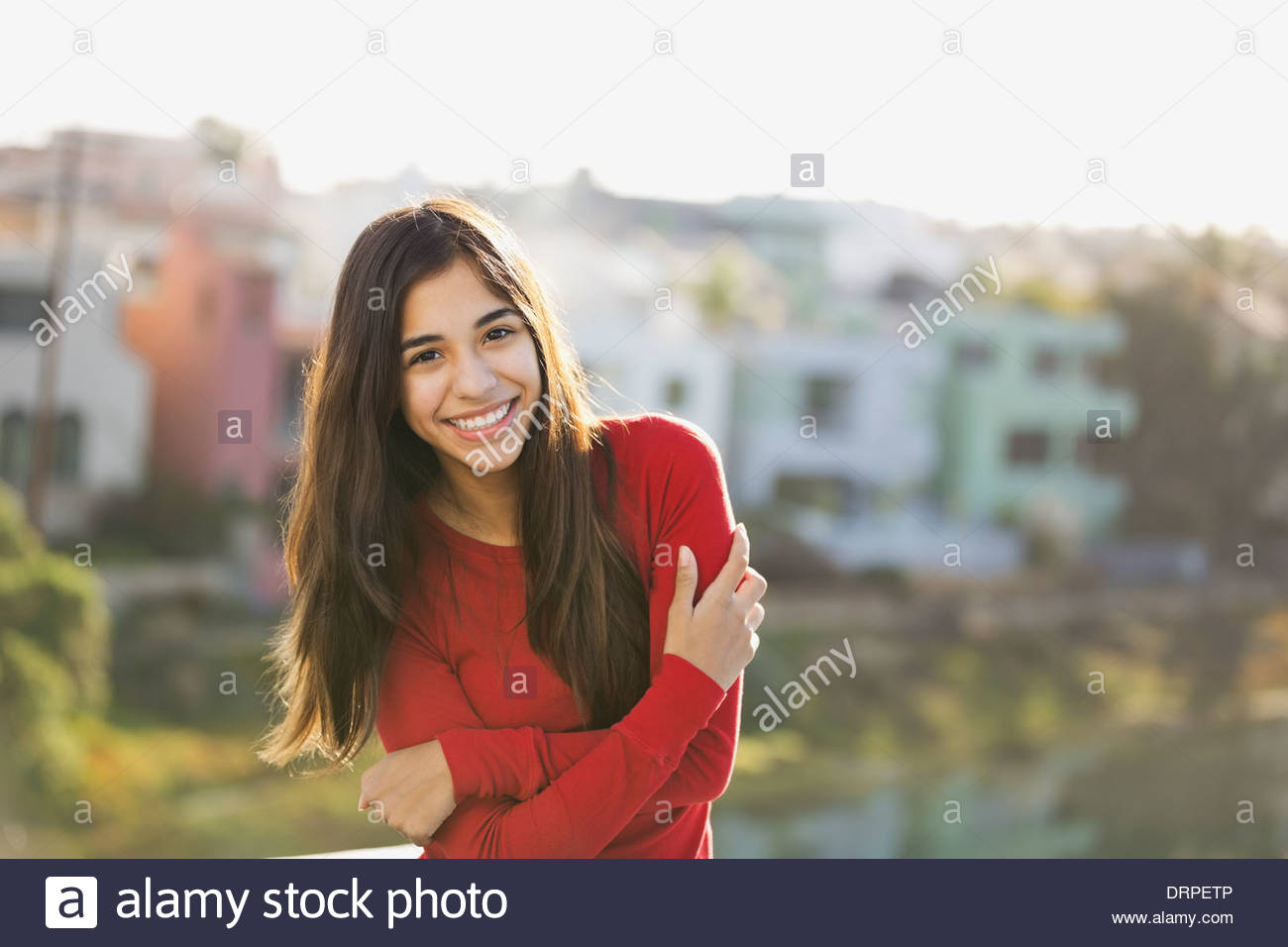 Girl standing outdoors hi-res stock photography and images - Alamy