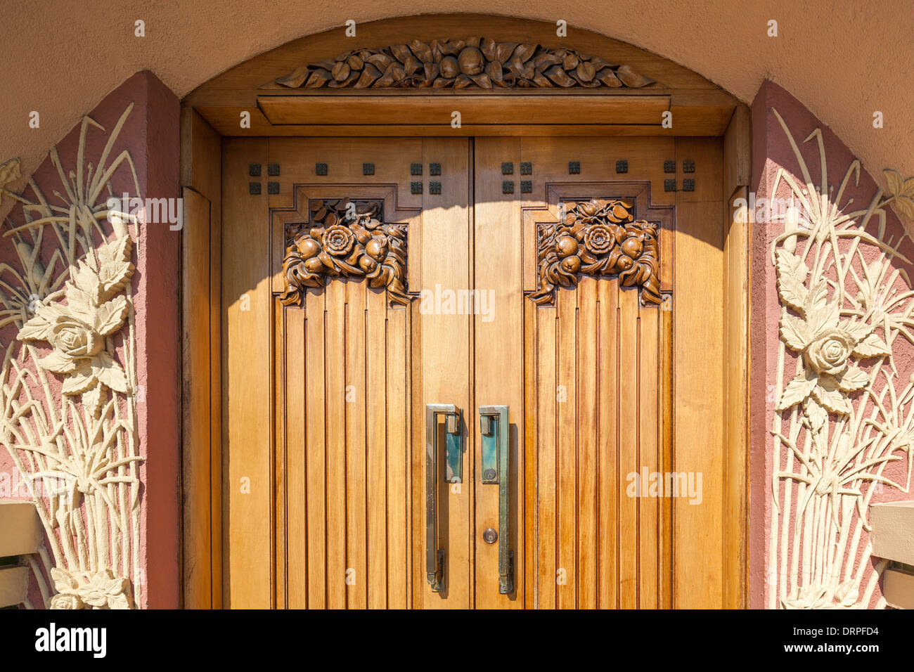 Carved doors of the famous Art Deco National Tobacco Company Building Rothmans Building in Ahuriri, Napier New Zealand Stock Photo