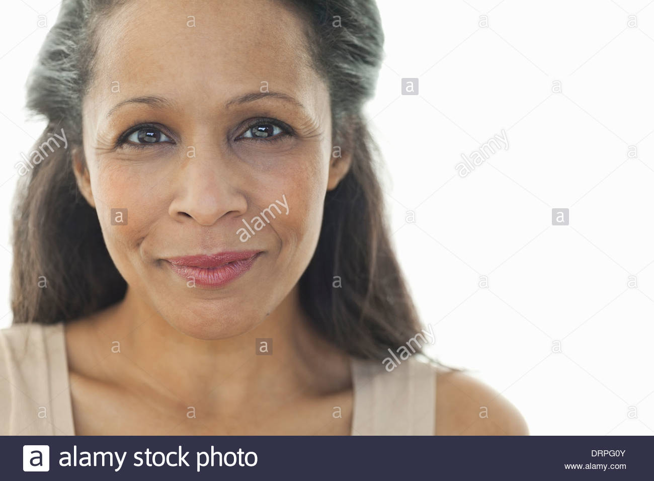 Close-up portrait of beautiful woman against white background Stock Photo