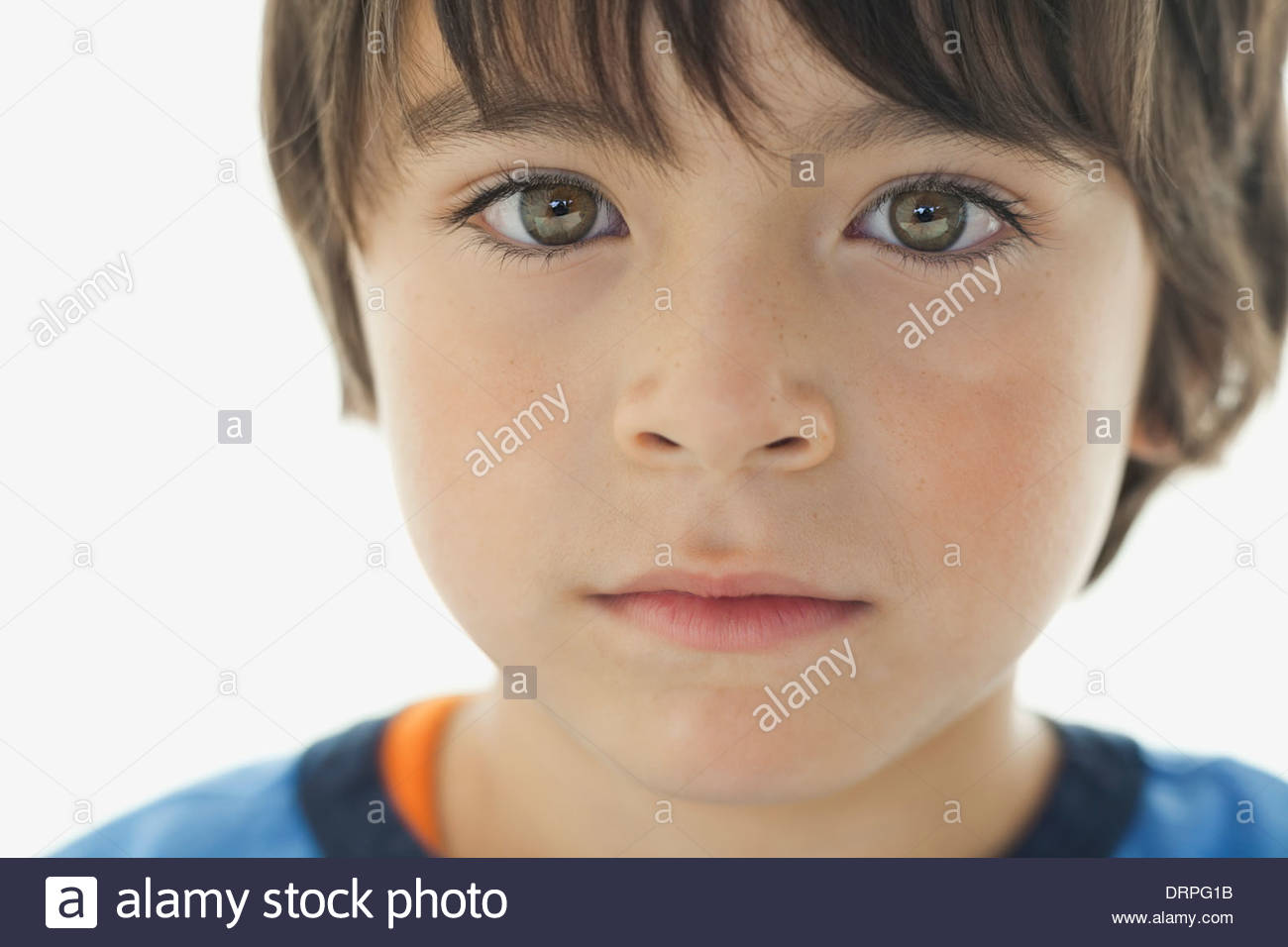Close-up portrait of boy looking at camera Stock Photo