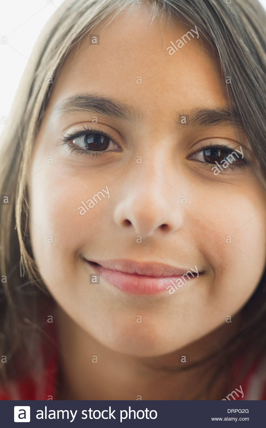 Close-up portrait of girl smiling Stock Photo