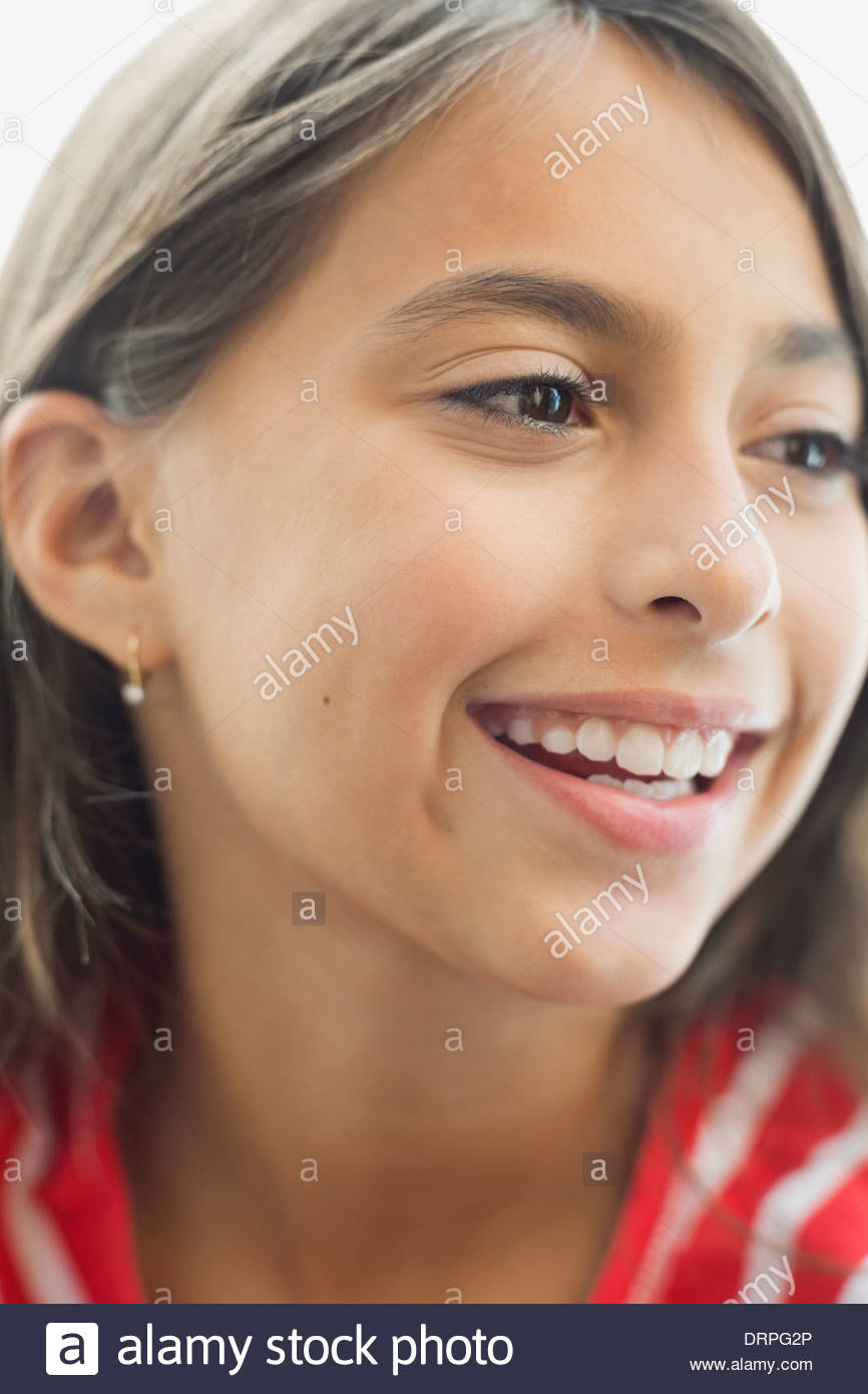Close-up of smiling girl looking away Stock Photo