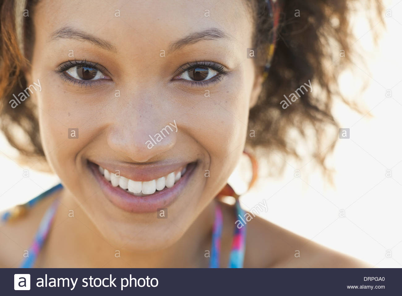 Close-up portrait of beautiful woman smiling Stock Photo