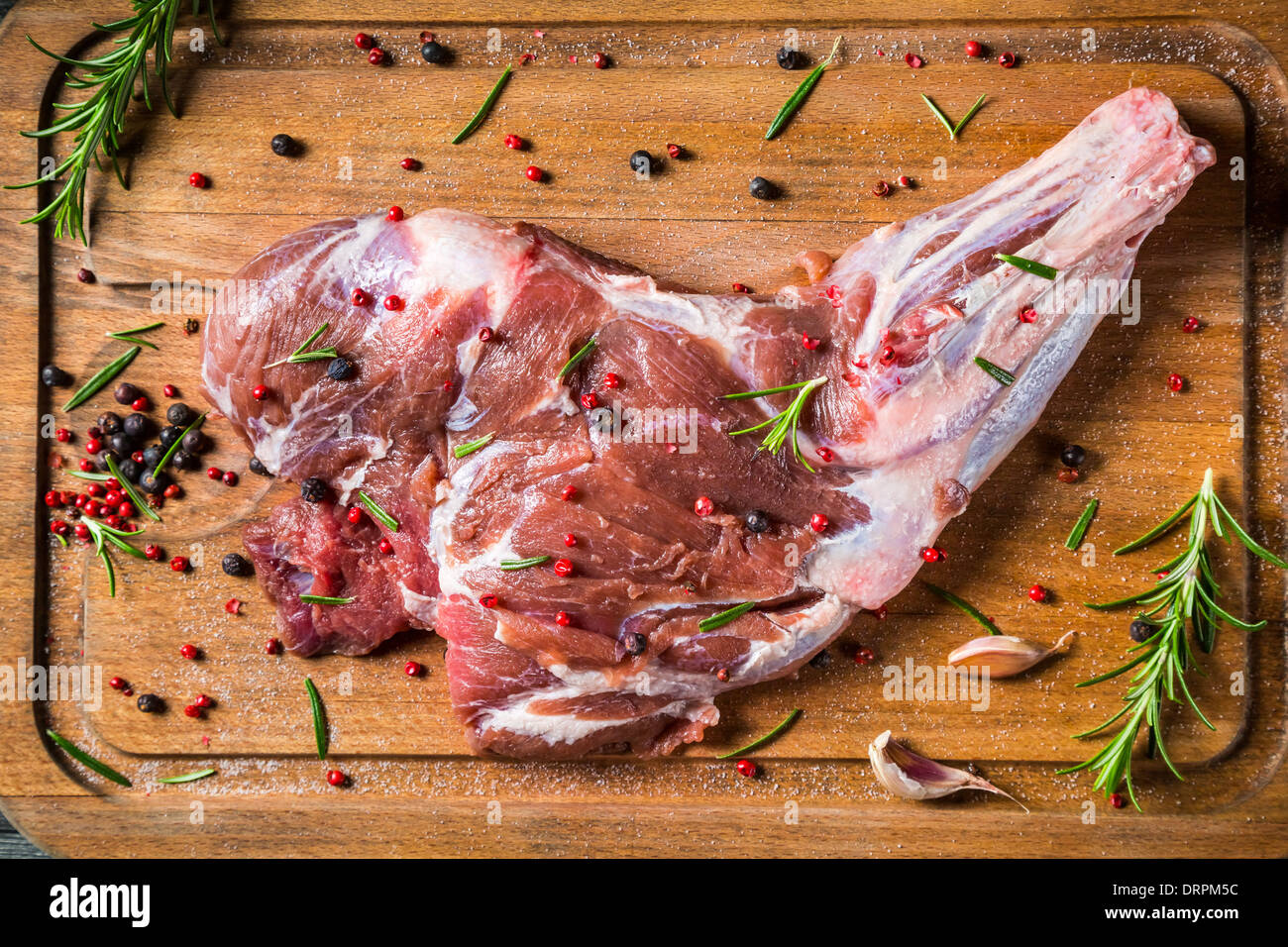 Fresh red meat flavored with rosemary and pepper Stock Photo Alamy