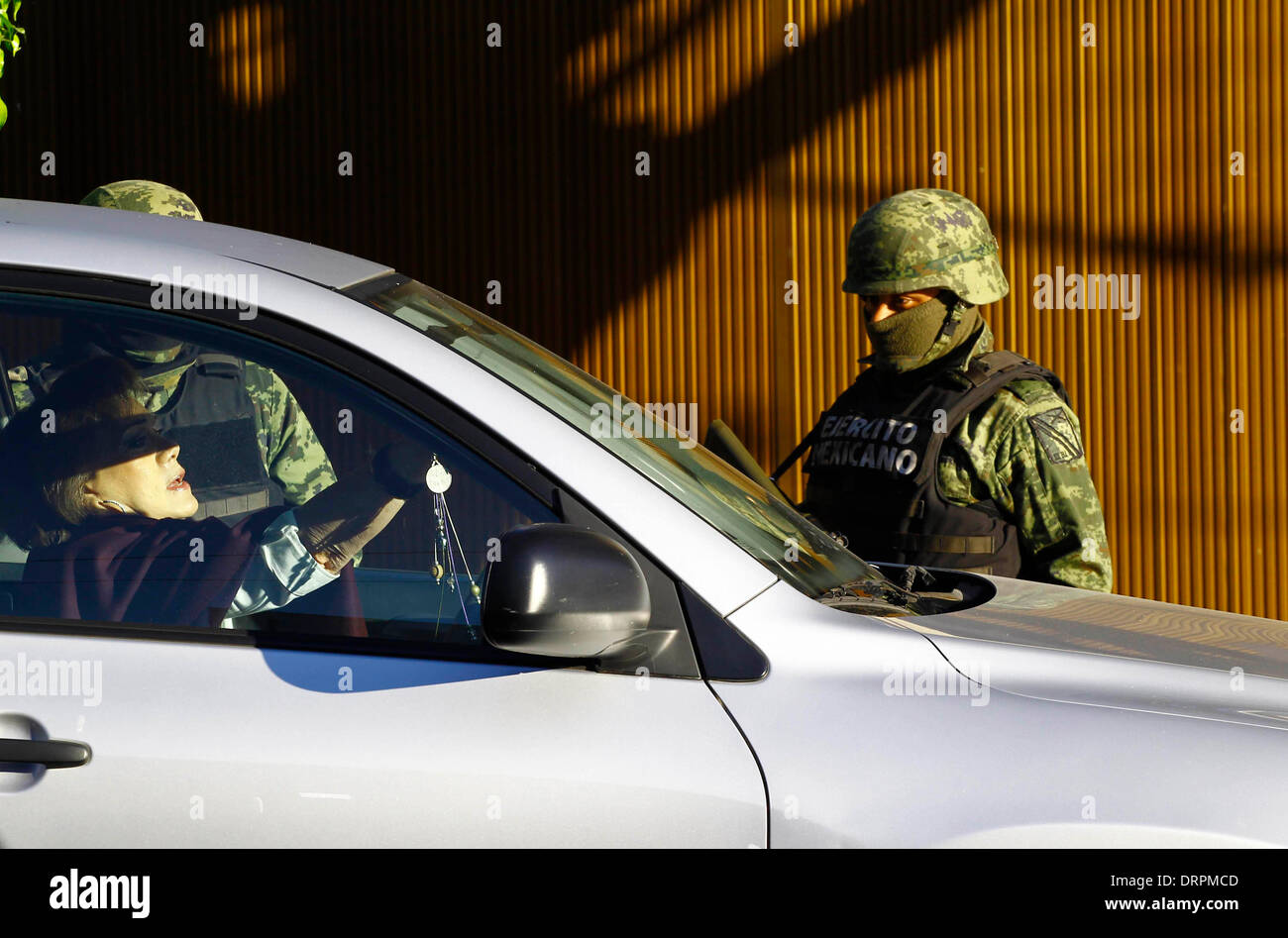 Jalisco, Mexico. 30th Jan, 2014. Members of the Mexican Army stand