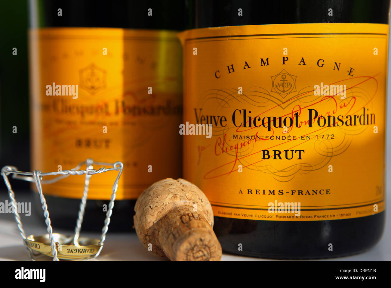 Opened bottles of Veuve Clicquot Ponsardin Champagne with cork and top Stock Photo