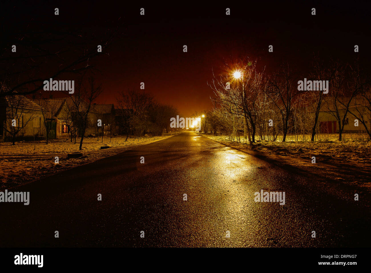 village street at cold winter night under lights Stock Photo Alamy