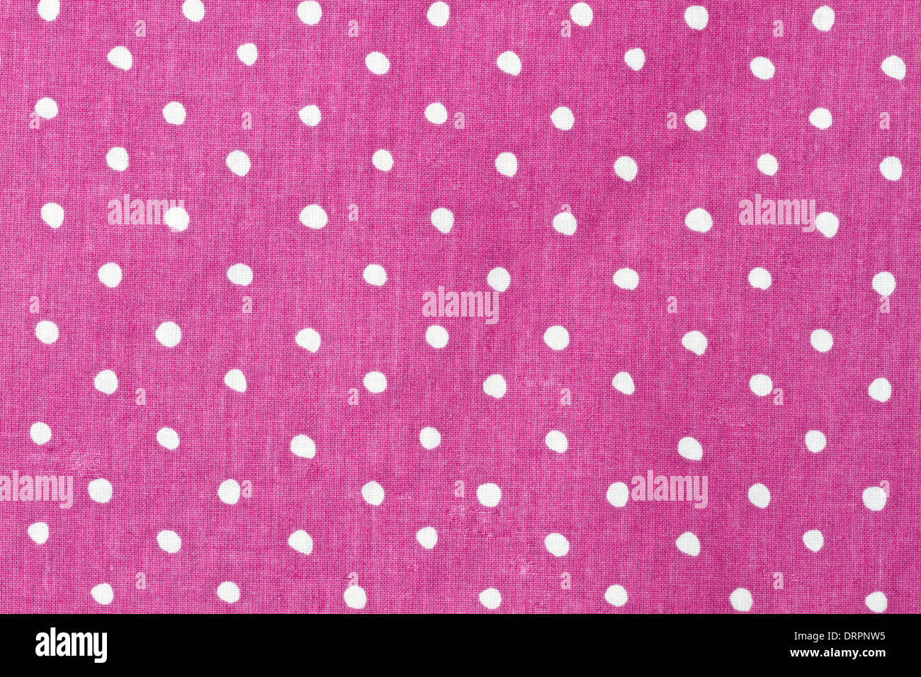 Pink and white dots fabric background Stock Photo Alamy