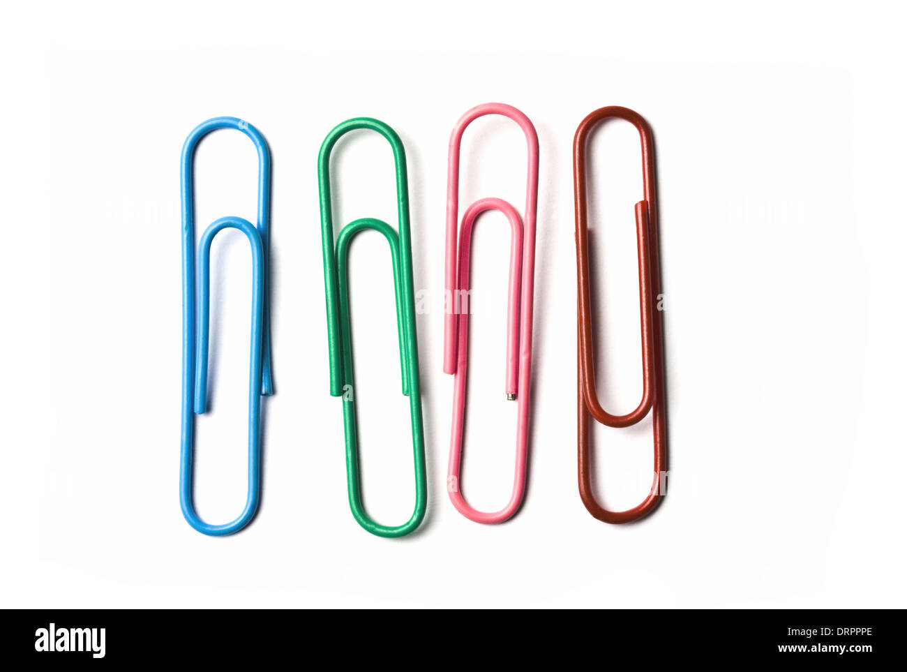 Four multicolored paperclips Stock Photo Alamy