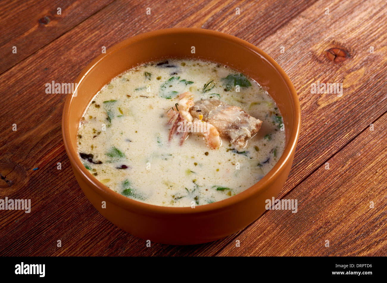 Seafood Chowder Fish Soup with Salmon, Cream and Potatoes .country