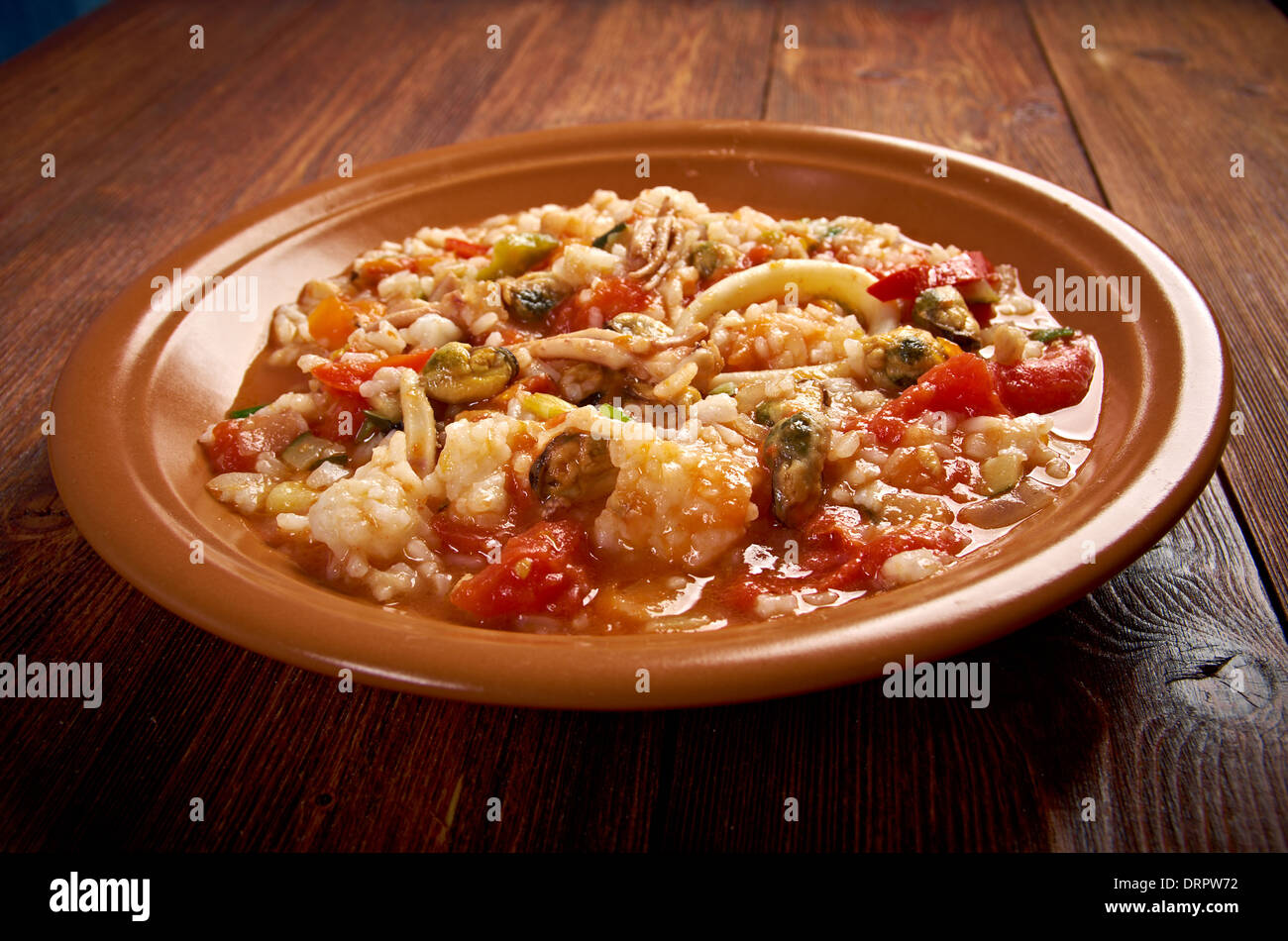 Paella Valenciana.traditional spanish paella with , seafood Stock Photo