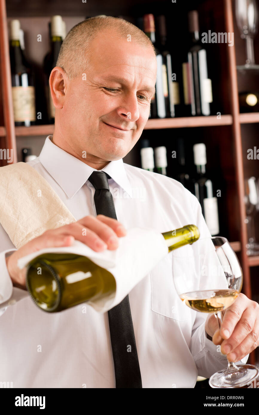 Waiter serve wine glass happy restaurant Stock Photo Alamy
