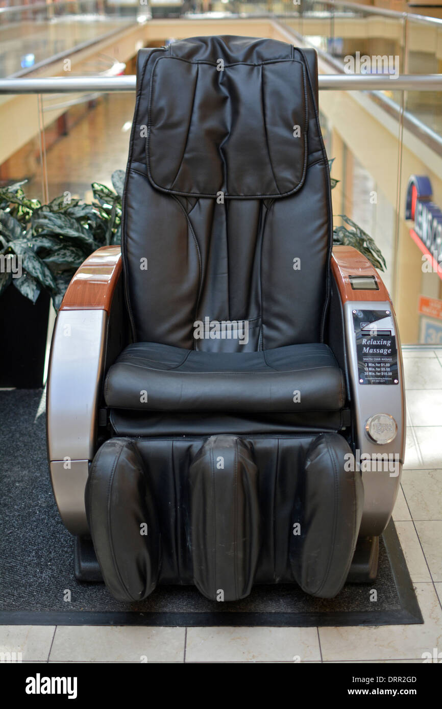 An easy chair at the Roosevelt Field Mall in Garden City Long Island where you can pay $1 for a relaxing 3 minute massage. Stock Photo