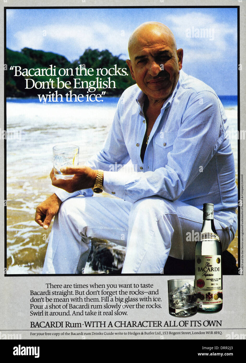 1980s fashion magazine advertisement advertising BACARDI RUM featuring Telly Savalas, advert circa 1983 Stock Photo
