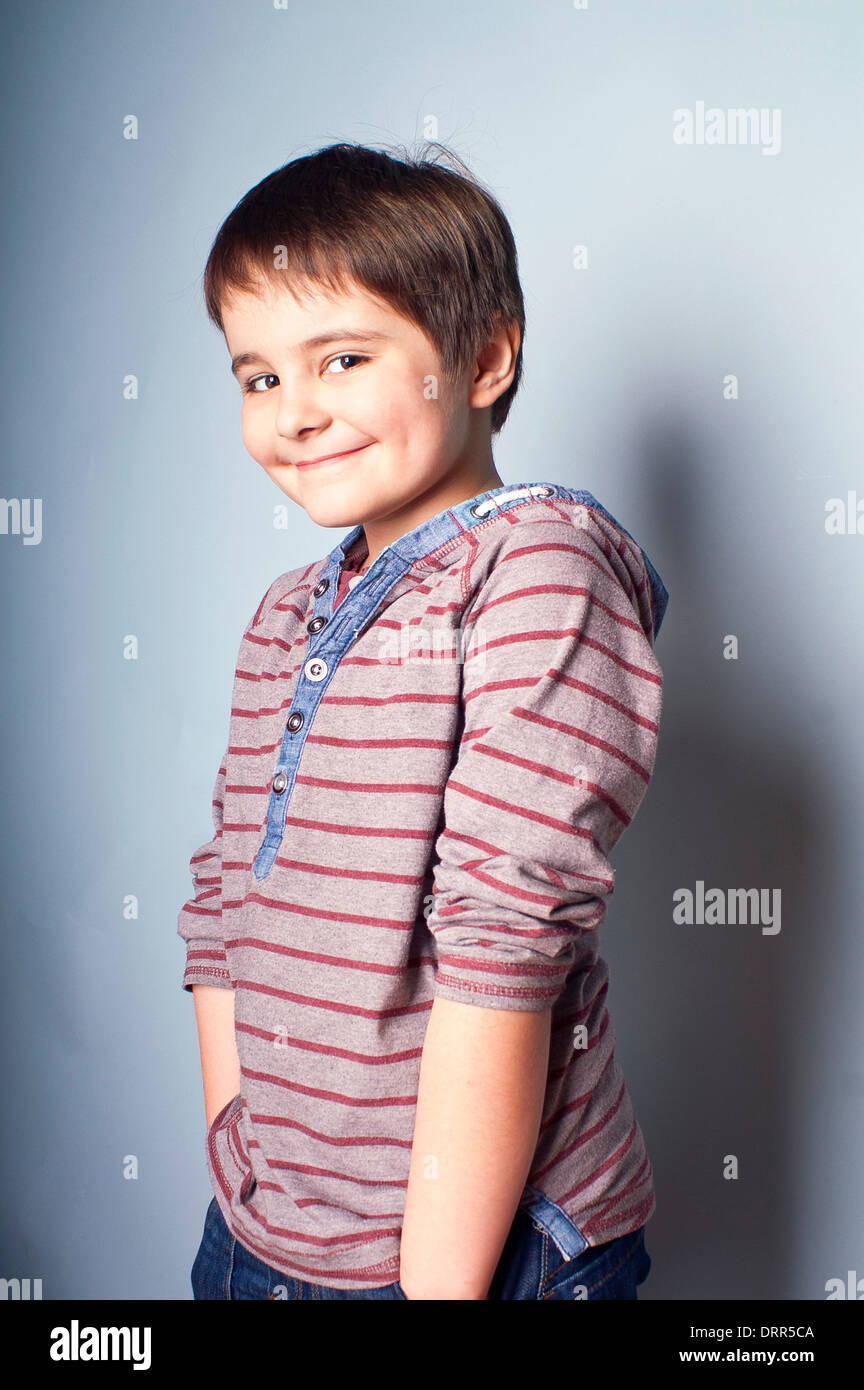 Boy standing with hands in pocket hi-res stock photography and images ...