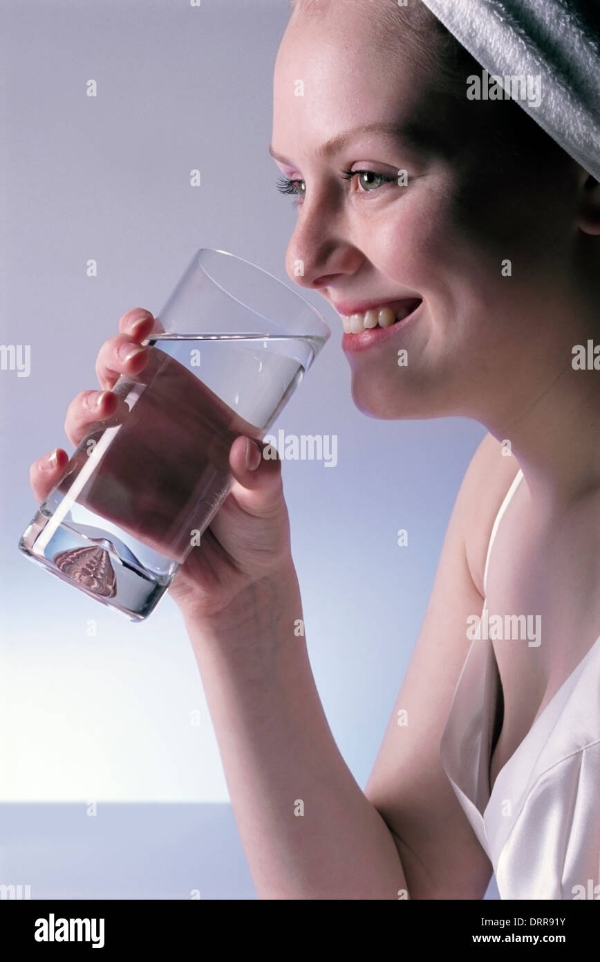 Young Woman drinking water Stock Photo
