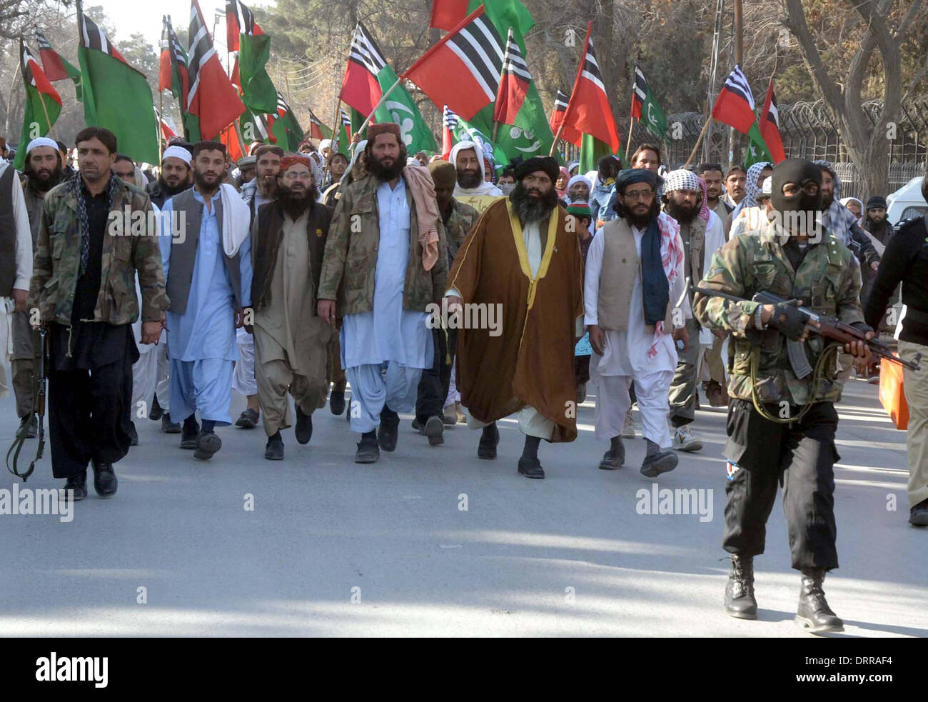 Activists and supporters of Ahle Sunnat Wal Jamat (Sipah-e- Sahaba) are chanting slogans against target killing of their leaders and fellow workers during a protest demonstration at Quetta press club on Friday, January 31, 2014. Stock Photo