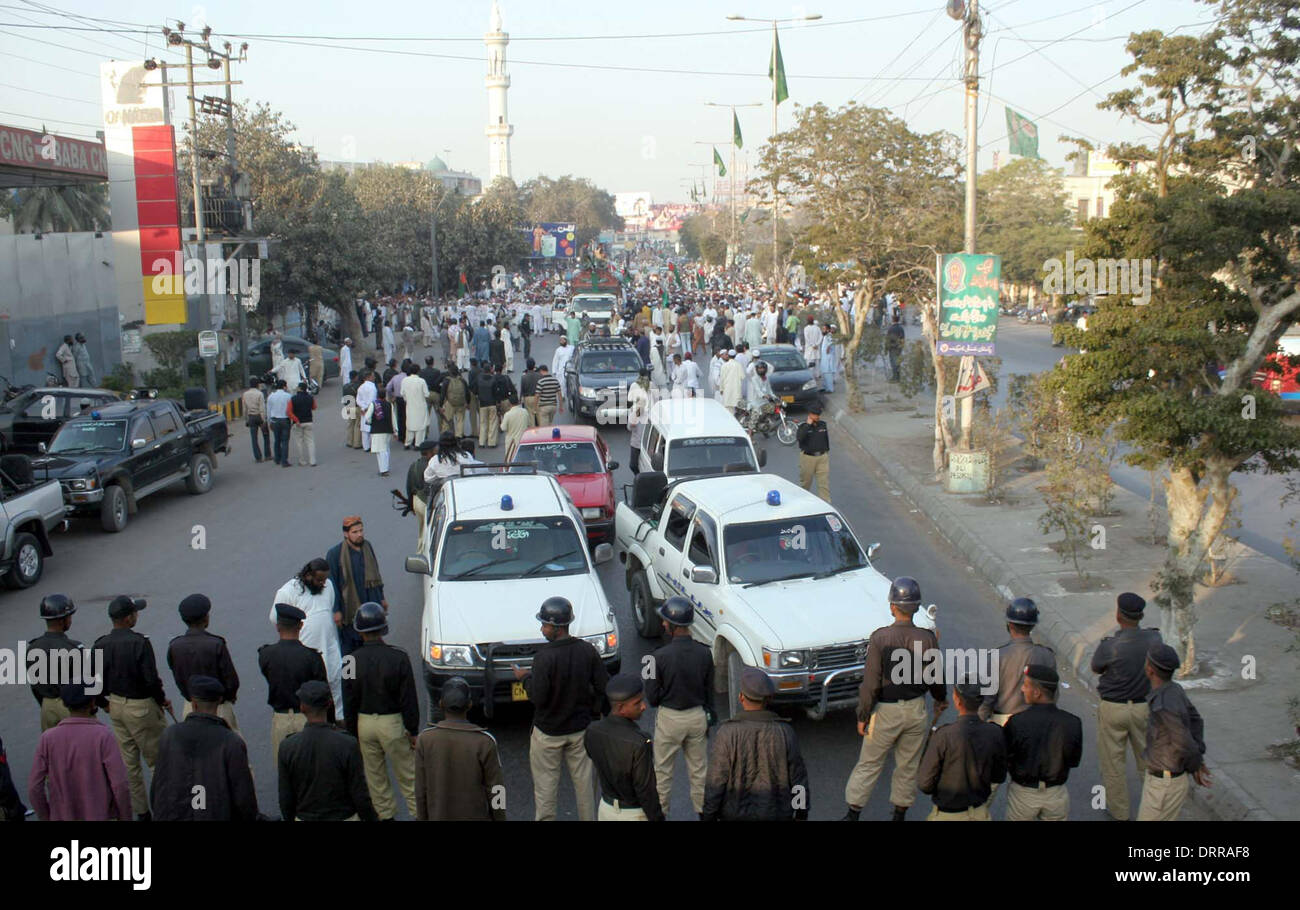Activists of Ahle Sunnat Wal Jamat (Sipah-e-Sahaba) are chanting slogans against target killing of their leaders and fellow workers during a protest demonstration at M.A Jinnah Road in Karachi on Friday, January 31, 2014. Stock Photo
