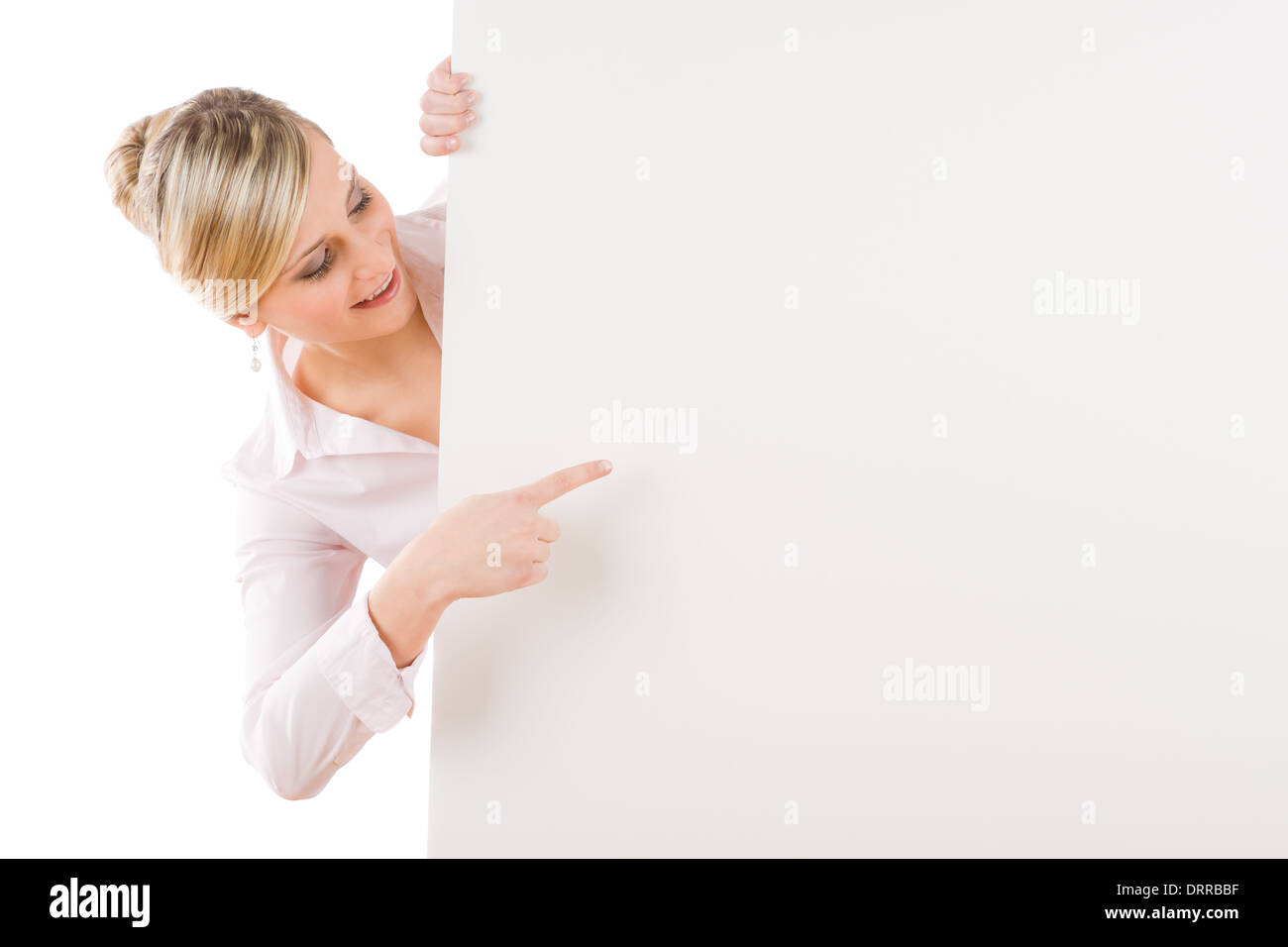 Businesswoman point aside at empty banner Stock Photo