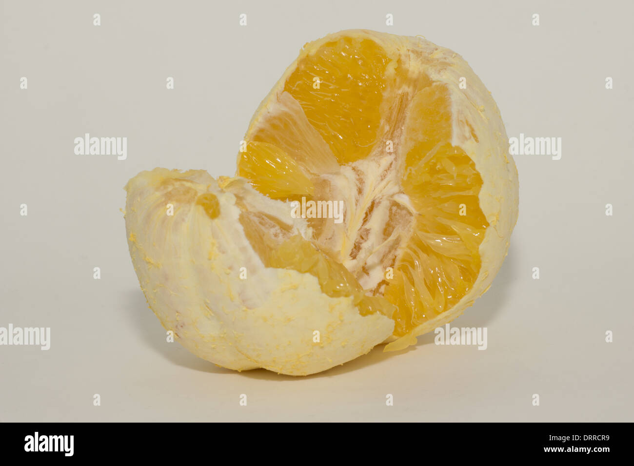 Peeled split open orange Stock Photo