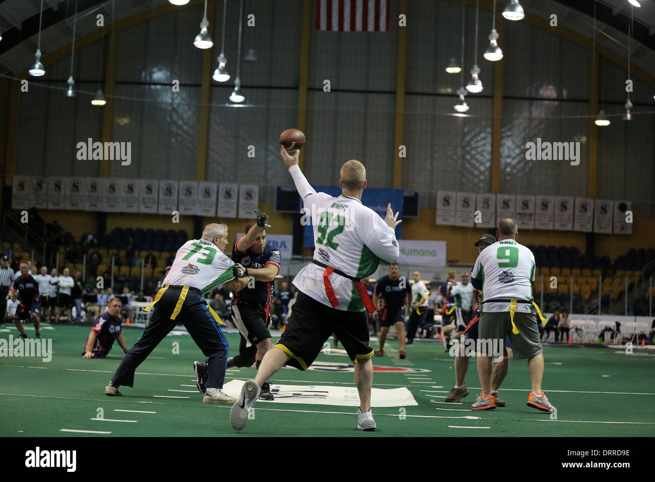 West Orange, New Jersey, USA. 29th Jan, 2014. Ex-NFL quarterback CHRIS SIMMS throws a pass for the First Responders in the second half of the charity game against the Wounded Warriors Amputee Football Team at Codey Arena. Credit:  Michael Cummo/ZUMA Wire/ZUMAPRESS.com/Alamy Live News Stock Photo