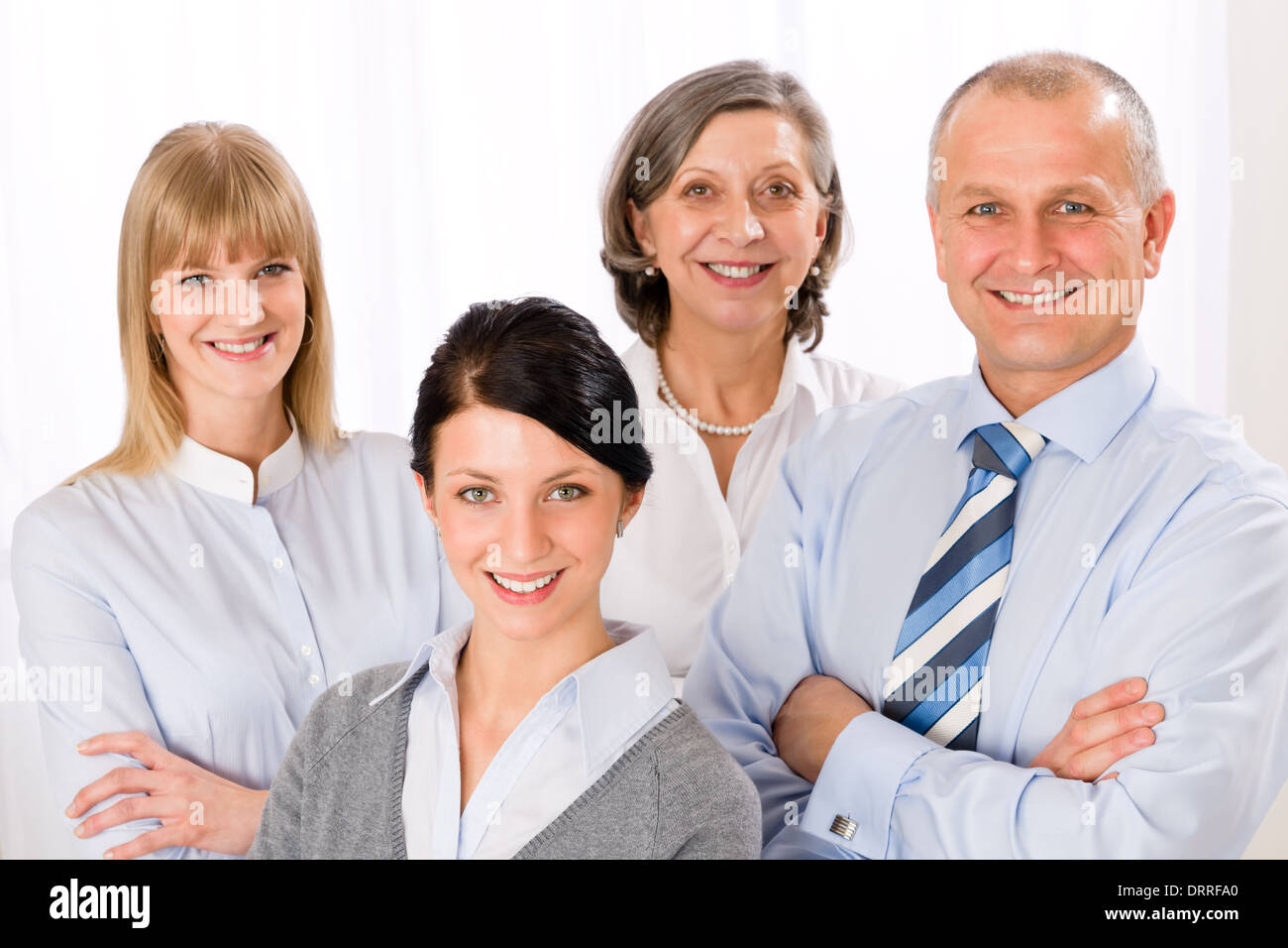 Confident business team smiling portrait Stock Photo