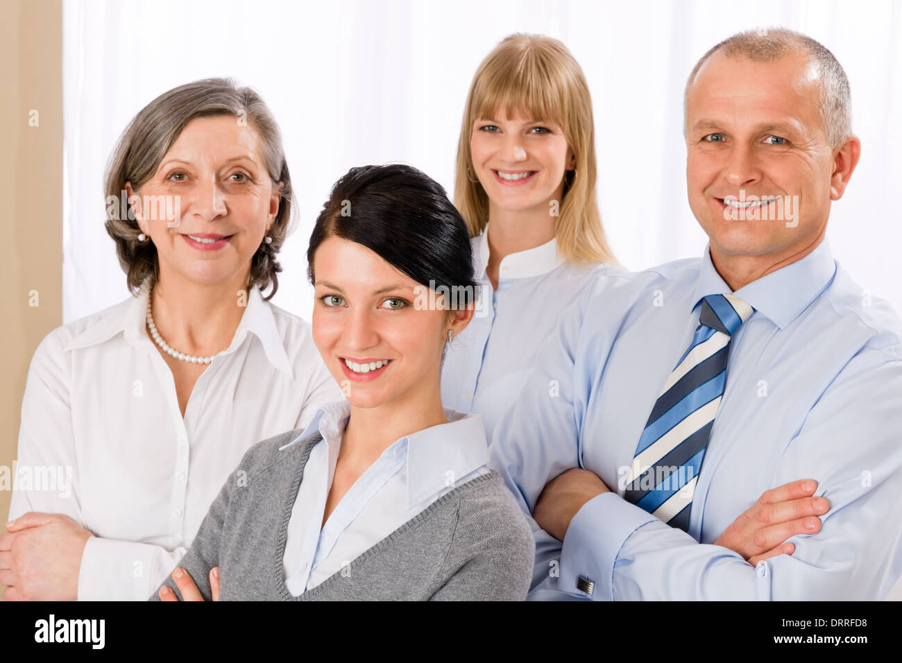 Confident business team smiling portrait Stock Photo