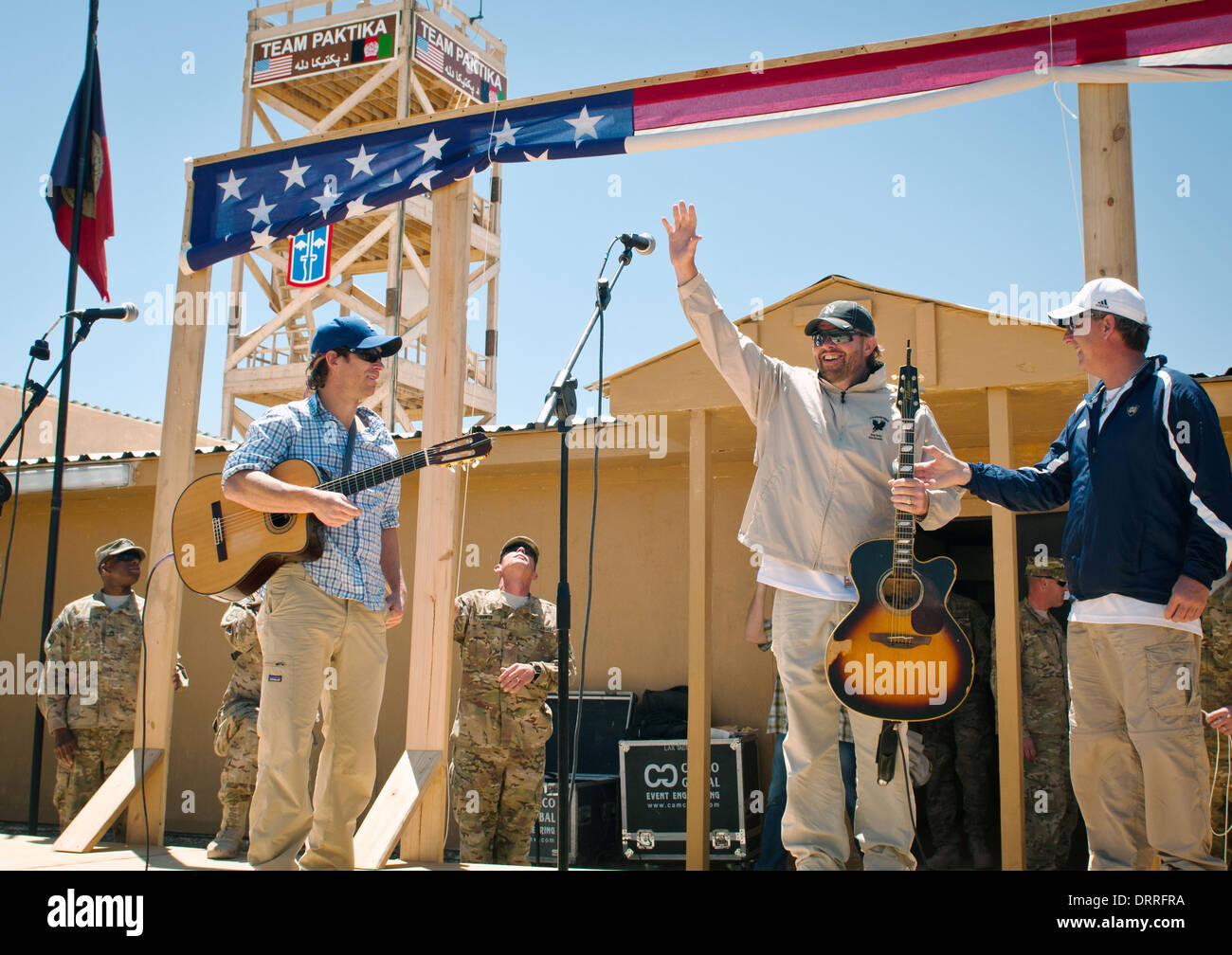 Country music superstar Toby Keith performs for the troops during a surprise concert April 29, 2012 at Forward Operating Base Sharana in Paktika province, Afghanistan. Stock Photo