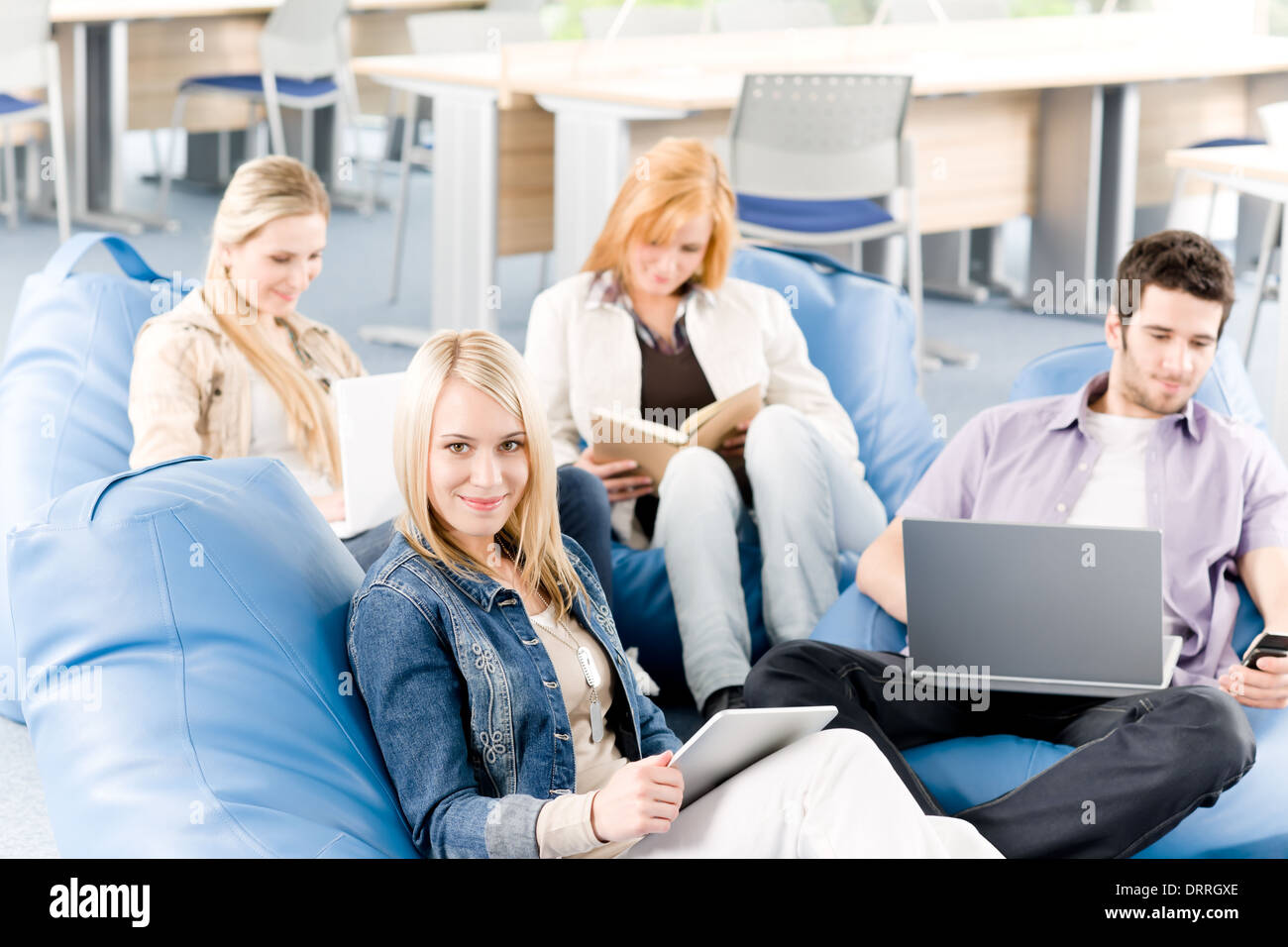 Group of young students at high school Stock Photo - Alamy