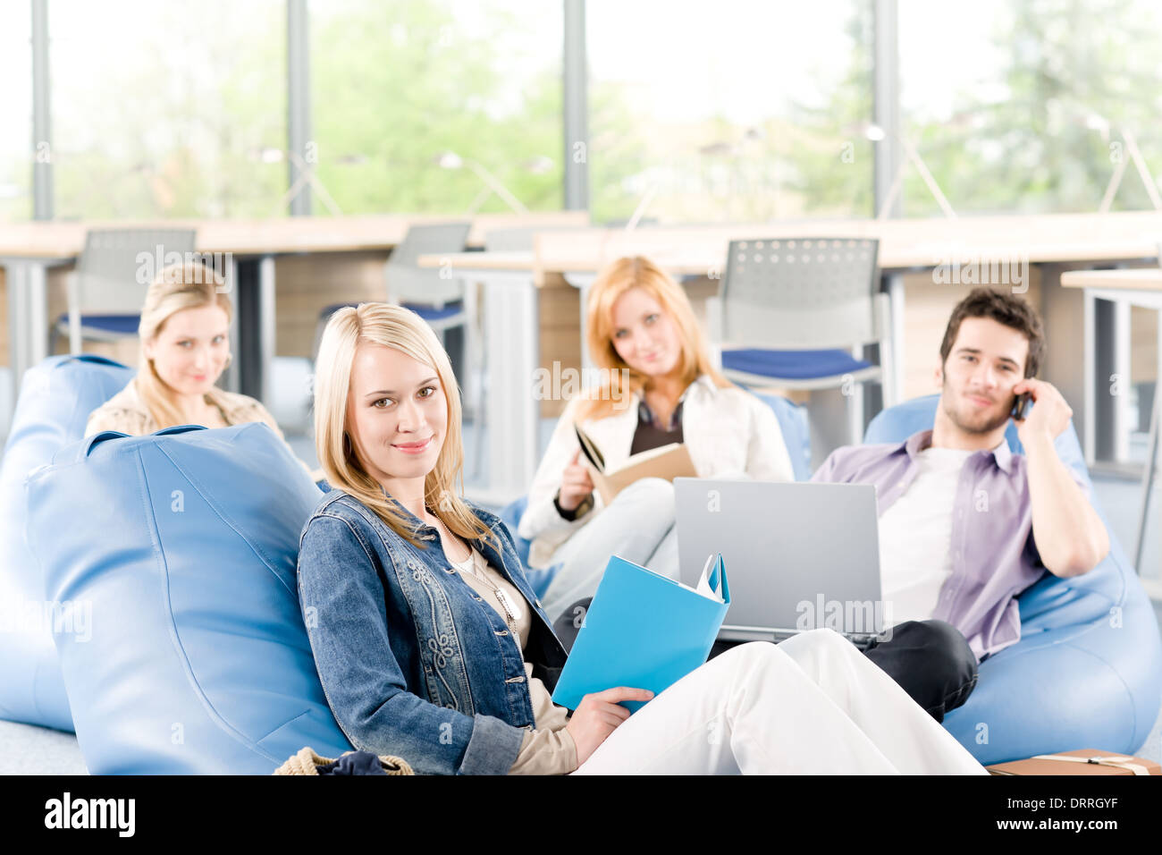 Group of young students at high school Stock Photo - Alamy